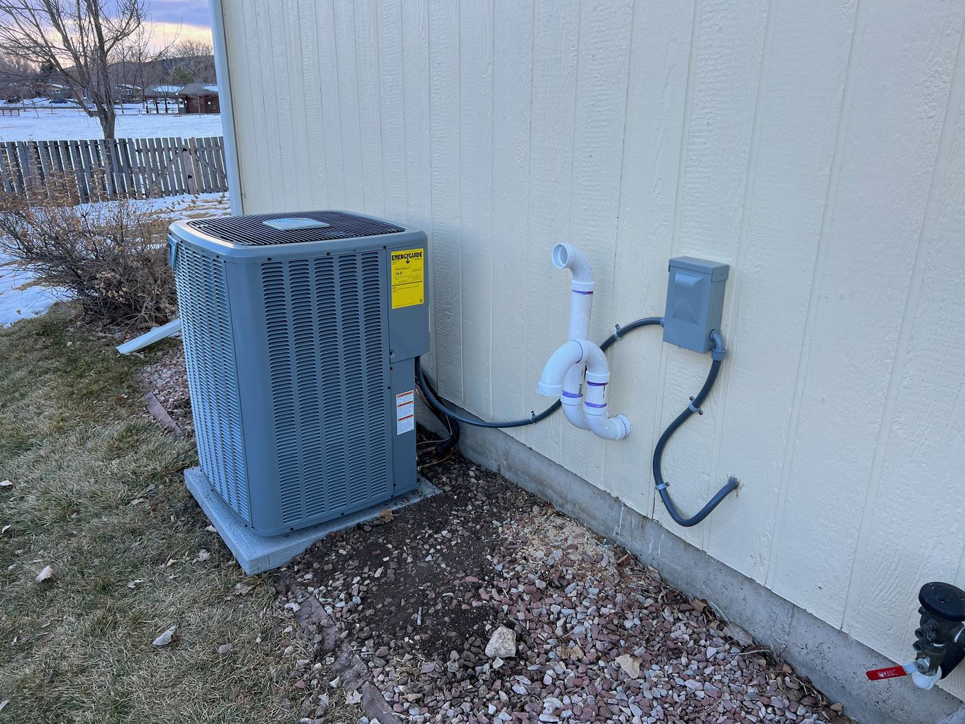 Central air on a pad in a Northern Colorado winter