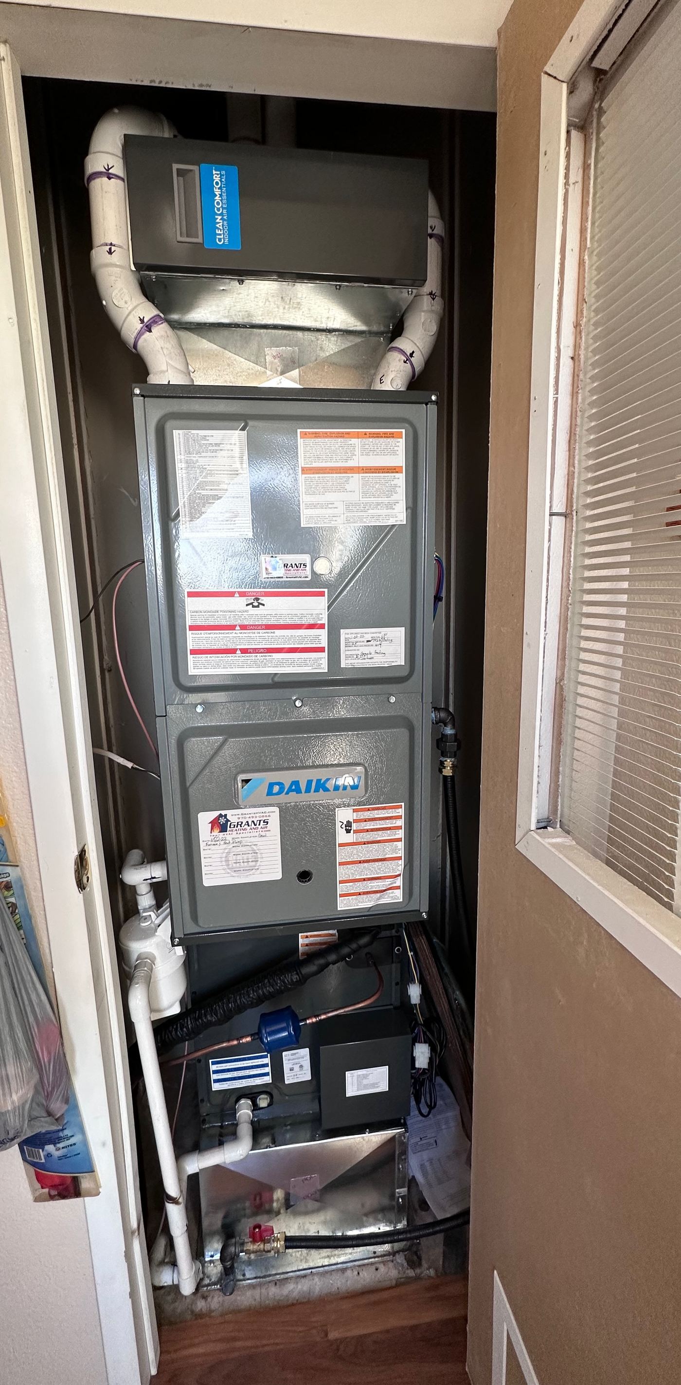 Closet Daikin furnace with Clean Comfort filter