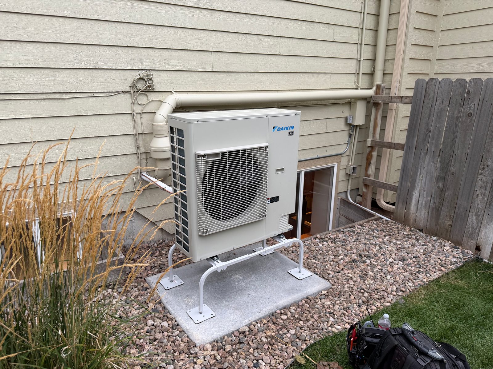 Daikin R32 heat pump on a stand — Grants HVAC install