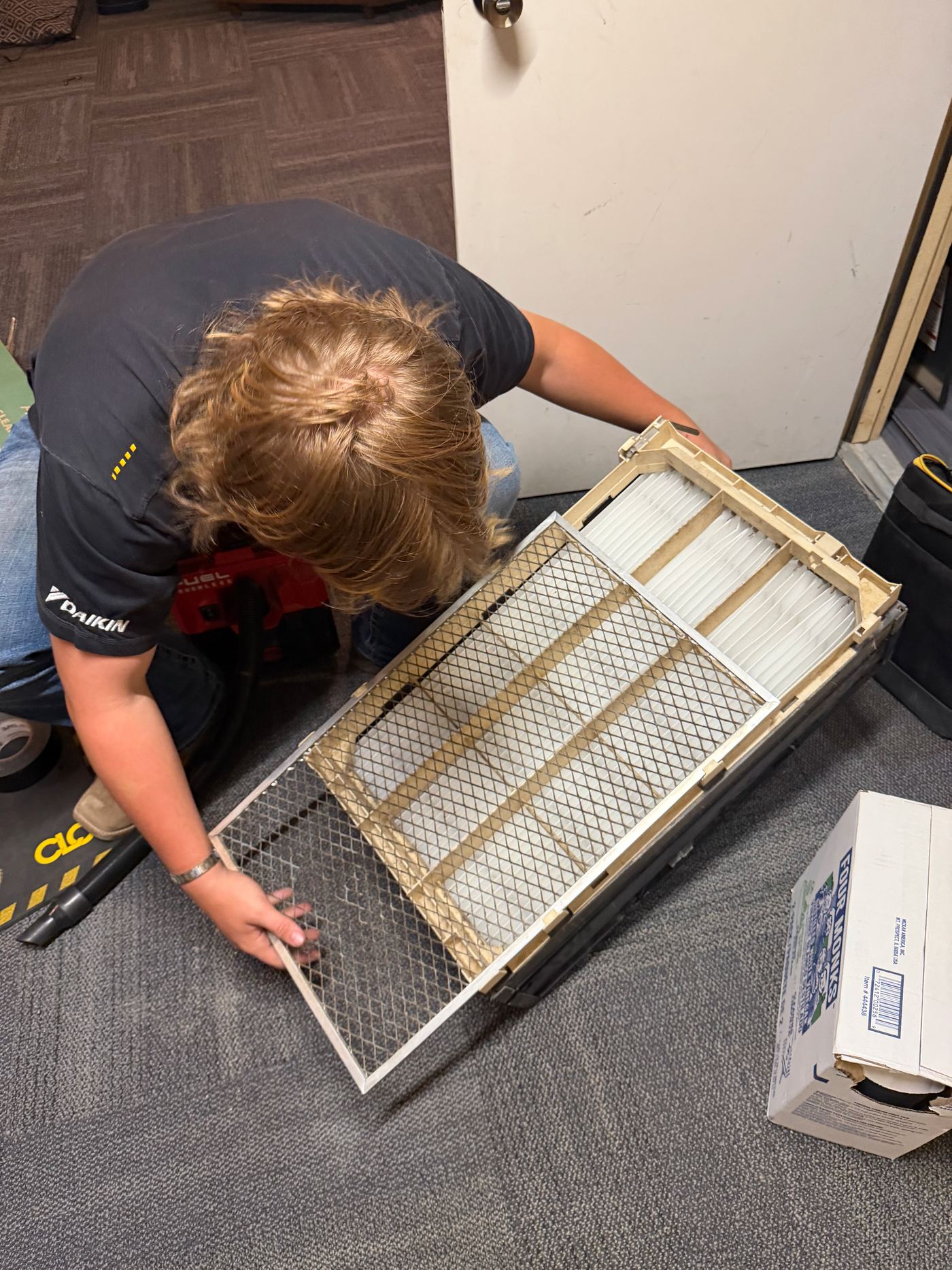 Media filter service during a maintenance visit