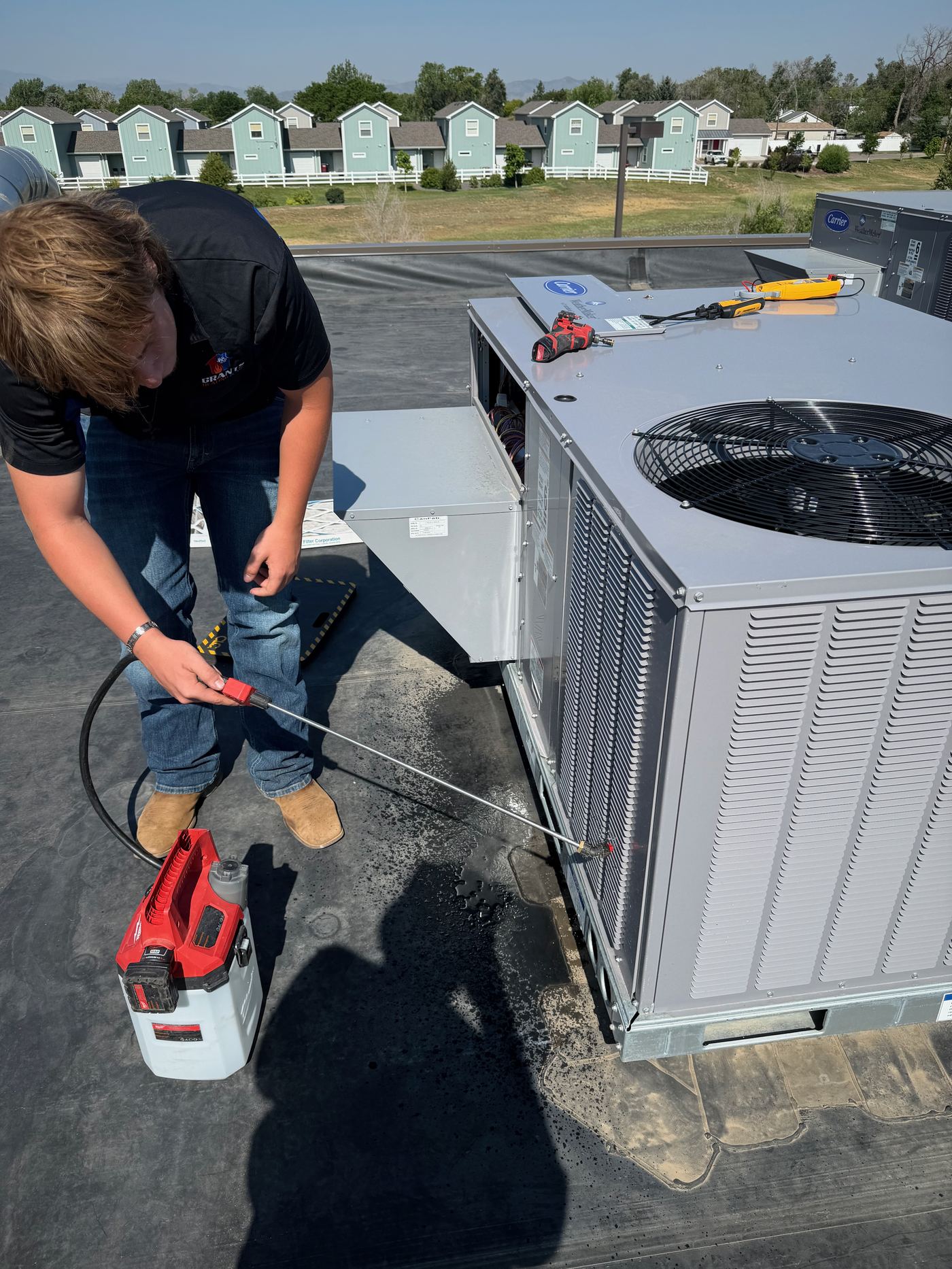 Coil cleaning on a rooftop Carrier — Grants HVAC